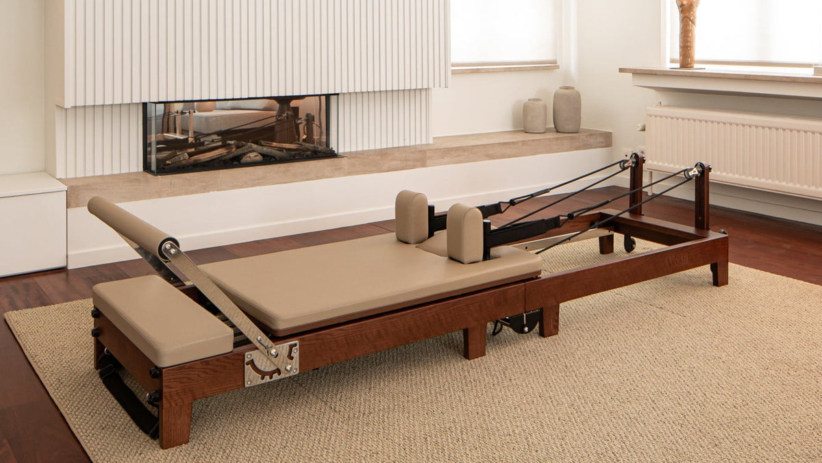 Wood Reformer The Walnut Foldable Pilates Reformer - solid wood construction
