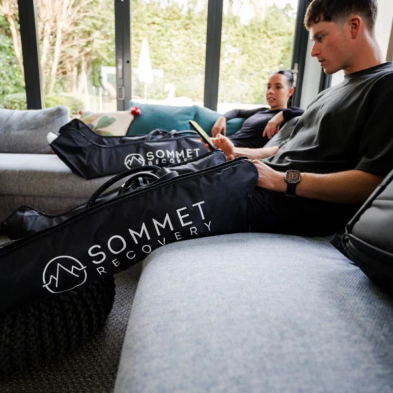 Sommet Recovery Compression Boots on Couch Side