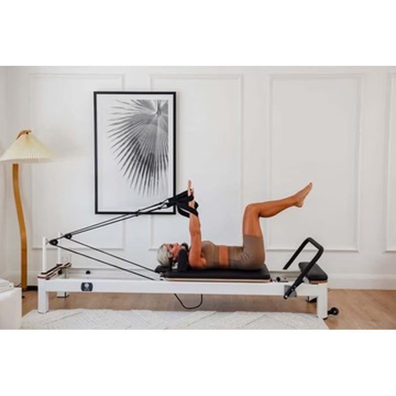 core-collab-queen-studio-pilates-reformer-lifestyle-woman-legs-up