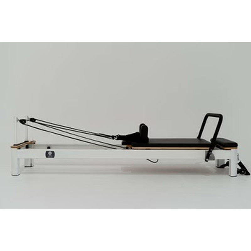 core-collab-queen-studio-pilates-reformer-side-view-white-frame